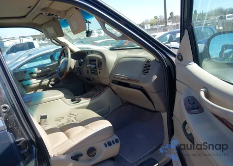 2000 Lincoln Navigator z USA, uszkodzony, nr VIN 5LMPU28A9YLJ03030